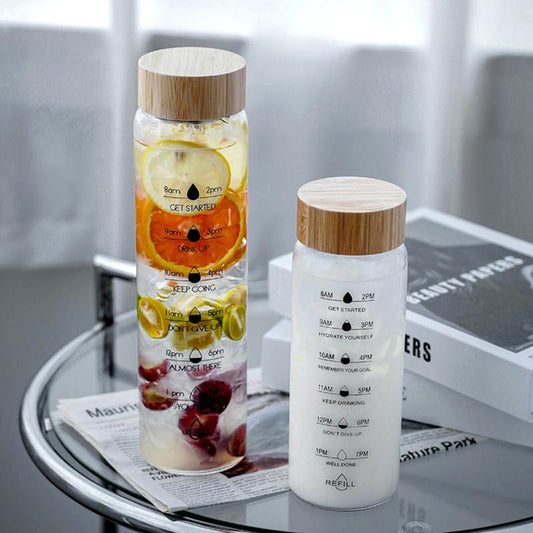 Glasflaska med tidsmarkeringar